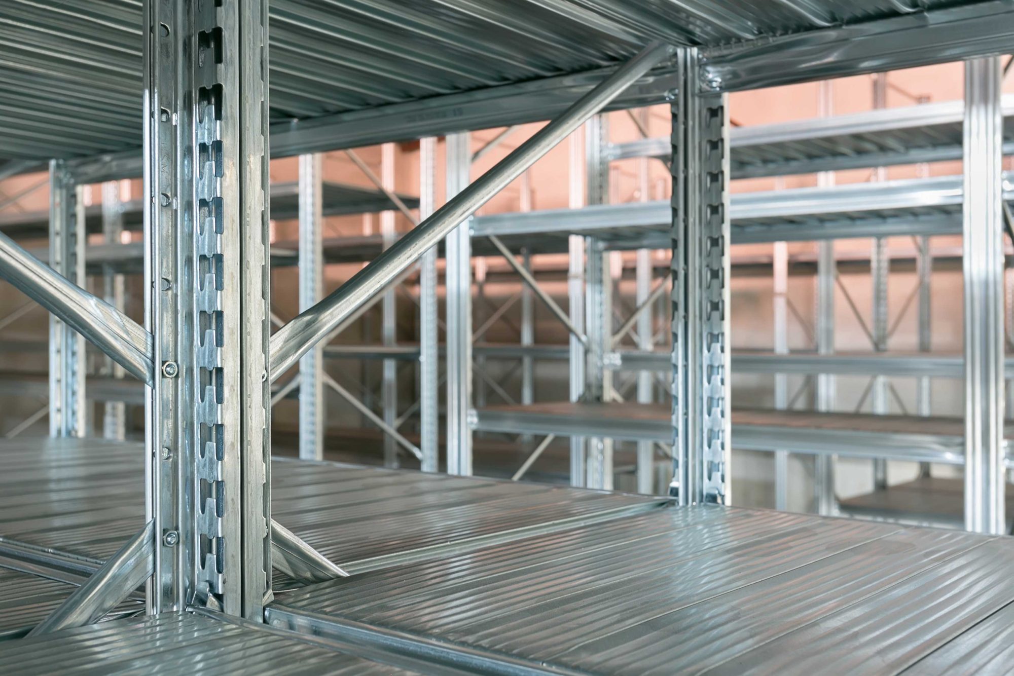 Empty warehouse racks, Empty metal shelf in storage room, storage concept Custom racking and storage solutions for agricultural clients